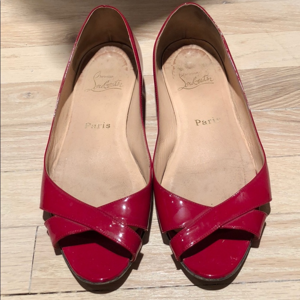 Christian Louboutin red patent cross cross flats